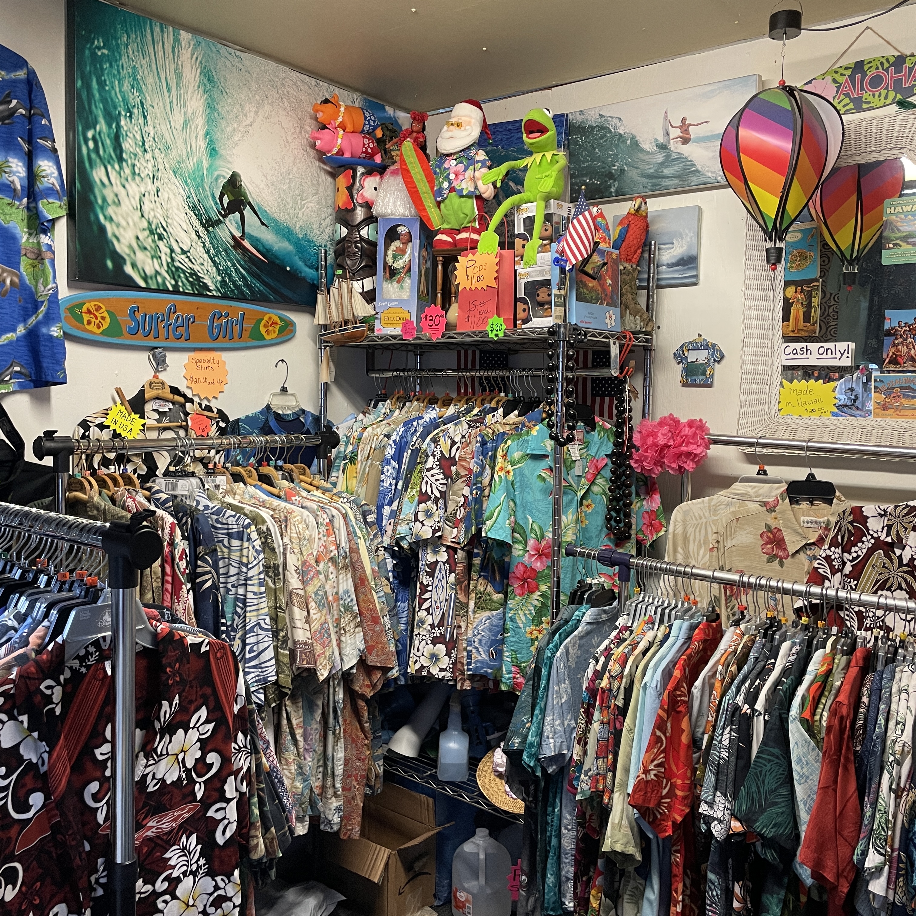Classic Hawaiian shirt patterns displayed at Guitar Stan's Daytona Beach shop, located inside the Corner Shops Mall.